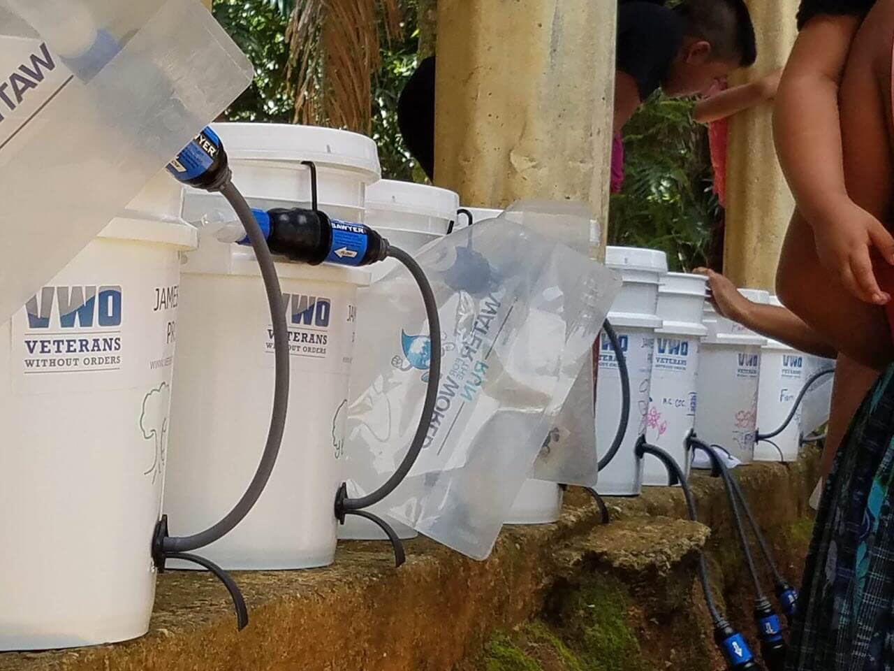 Water Filtration Buckets Solving Water Crisis with Help of Military Vets